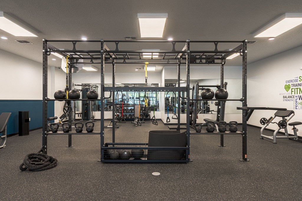 a view of the weights area in the gym at The Harbours Apartments, Clinton Twp, 48038