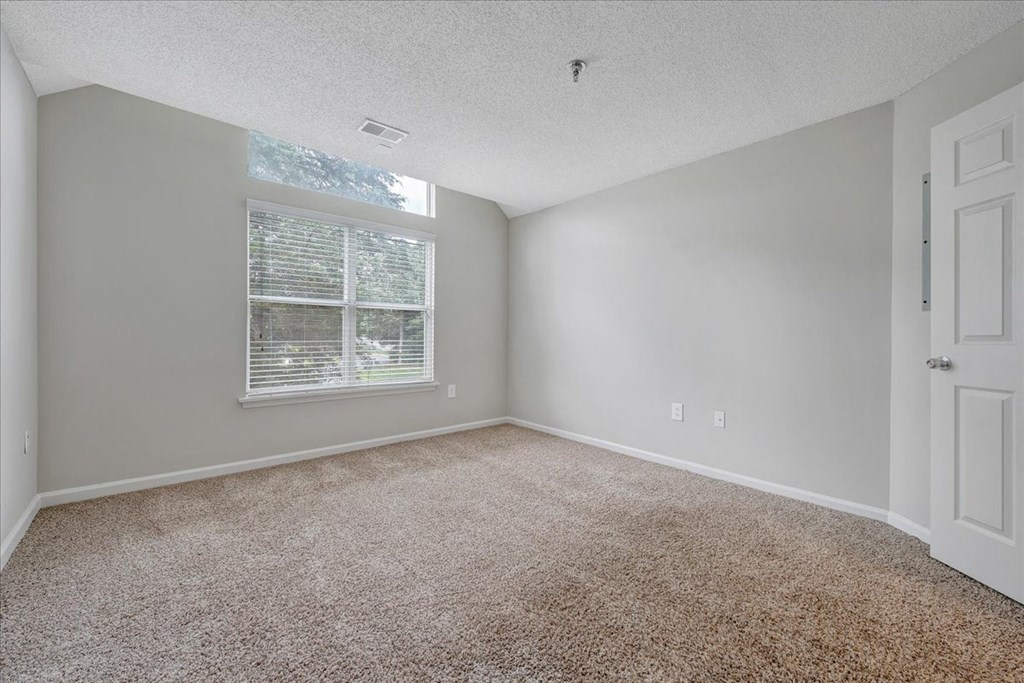 High Ceiling and Carpeted Bedroom  at Trophy Club at Bellgrade, Midlothian