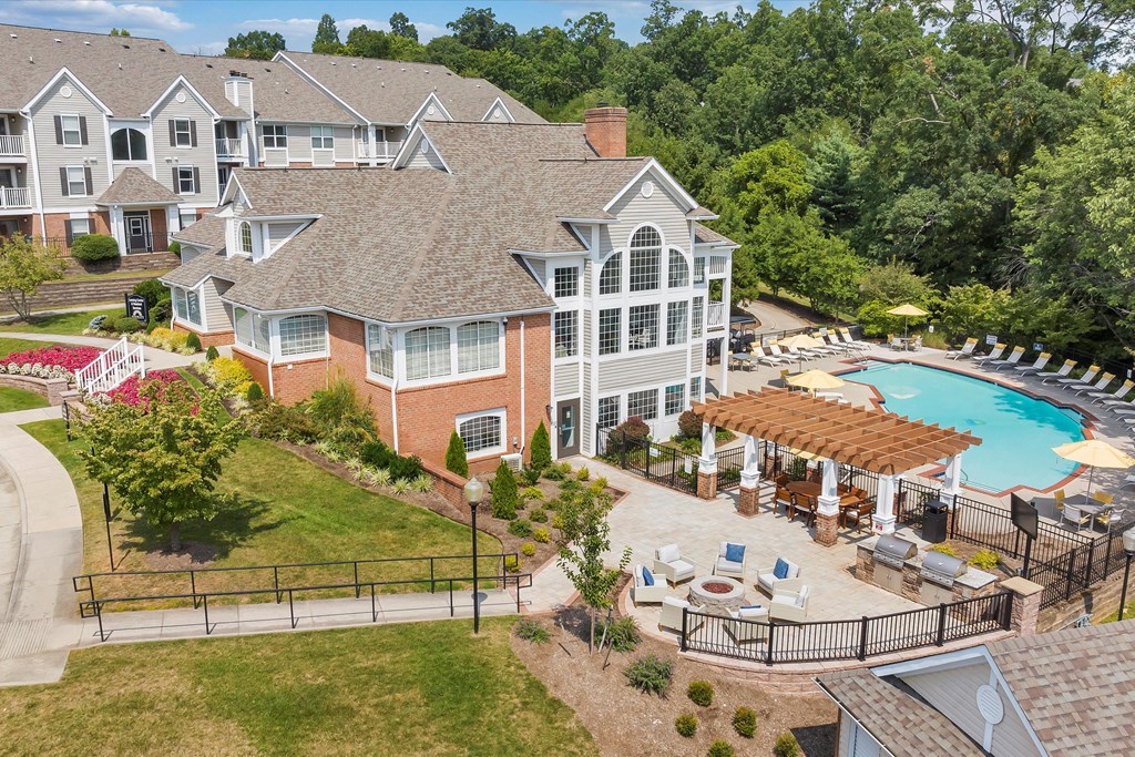 an aerial view of a large house with a swimming pool and patio at Sunscape Apartments, Virginia, 24018