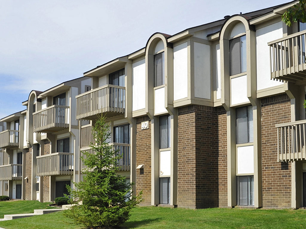 Apartment Building Exterior at The Village Apartments, Michigan, 48393