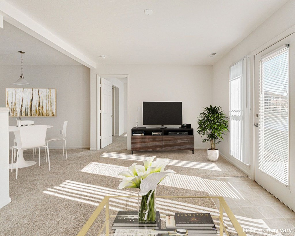 Buttercup Layout Model Living Room with Dining Area at The Harbours Apartments, Michigan 48038