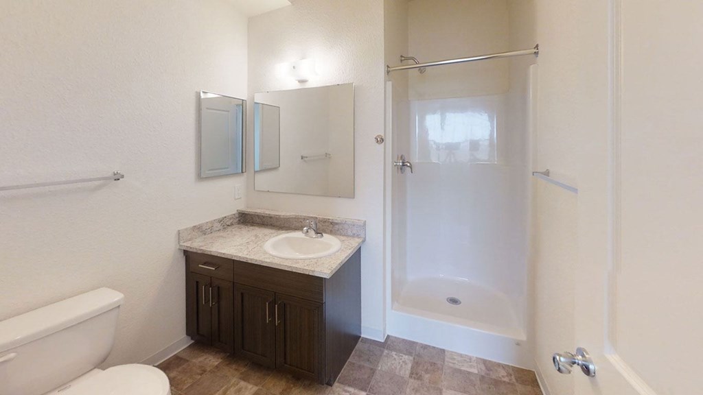 a second bathroom with a walk-in shower at Andover Pointe Apartment Homes, La Vista