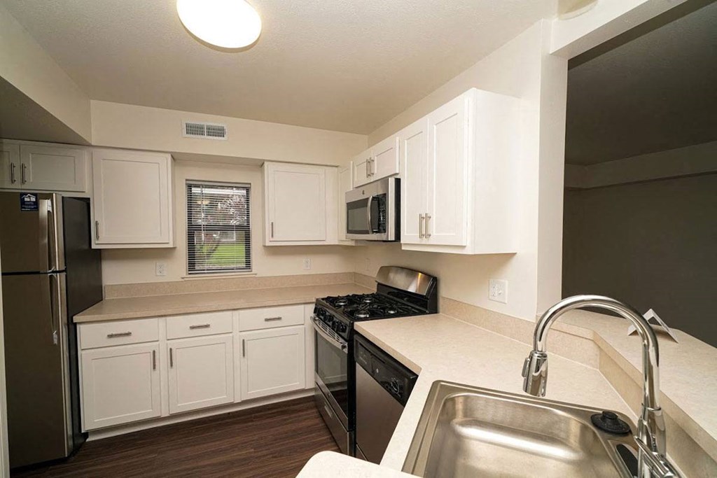 a renovated end style kitchen with a window  at Arbor Lakes Apartments, Indiana, 46516