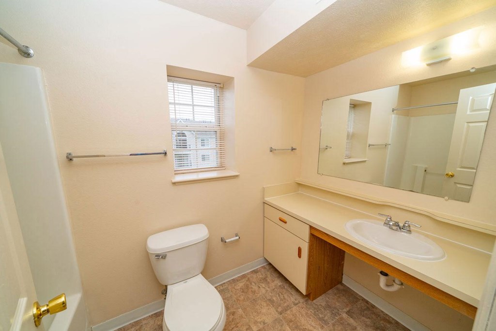 a bathroom with a window at Autumn Lakes Apartments and Townhomes, Indiana, 46544
