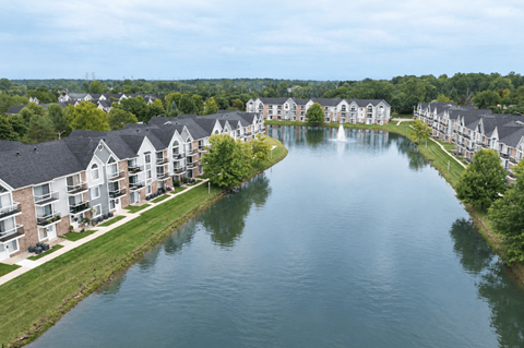 A large body of water surrounded by buildings.