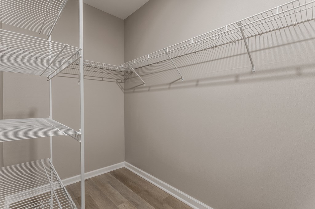 the spacious walk in closet of a bedroom at Alexandria of Carmel Apartments, Carmel, 46032