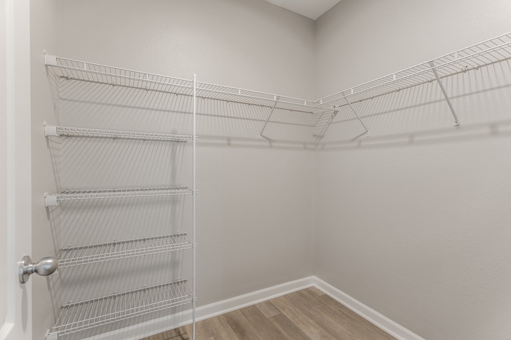 the spacious walk in closets in every apartment at the flats at west end apartments at Alexandria of Carmel Apartments, Indiana