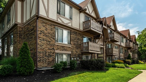 A row of apartment buildings with balconies and windows