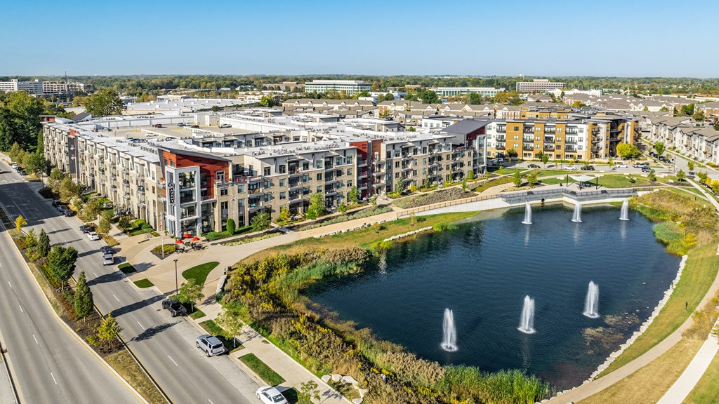 an aerial view of a city with a lake and buildings at Avant & Avant II, Carmel, IN, 46032
