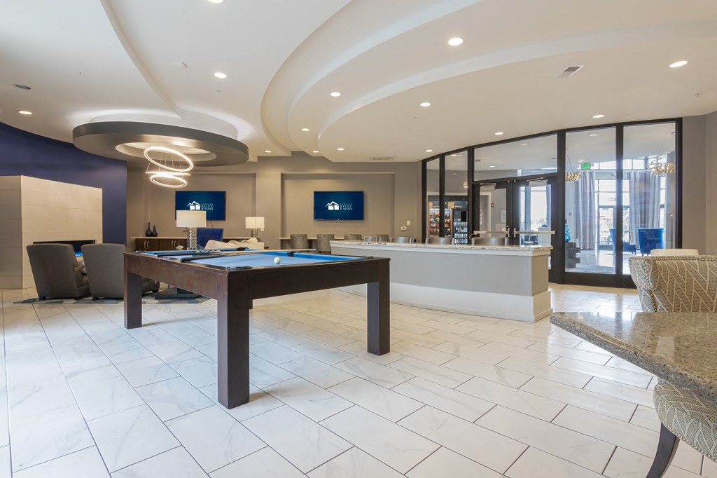a lounge with a pool table TVs and work stations in Carmel, IN, 46032