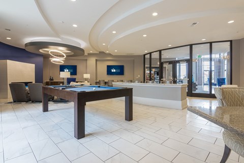 a lounge with a pool table TVs and work stations in Carmel, IN, 46032