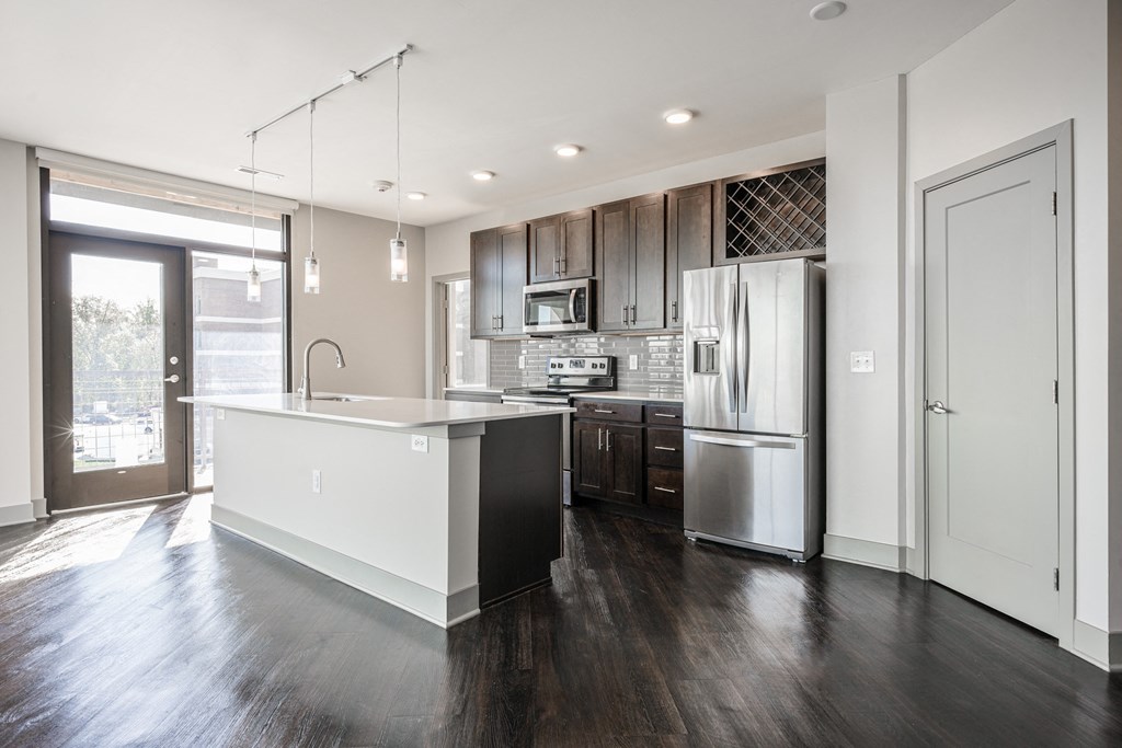 a kitchen with a large island and stainless steel appliances at Avant & Avant II, Carmel, IN, 46032