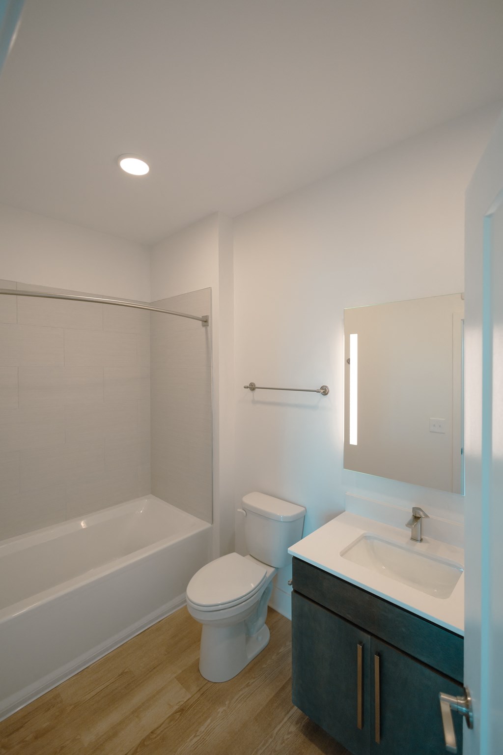 a bathroom with a toilet sink and bathtub  at Avant & Avant II, Carmel, IN, 46032
