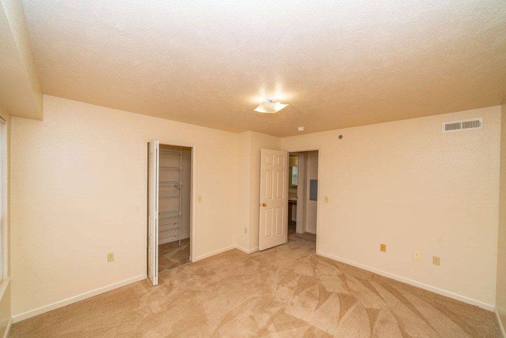 spacious bedroom with walk-in closet at Brentwood Park Apartments, La Vista, NE