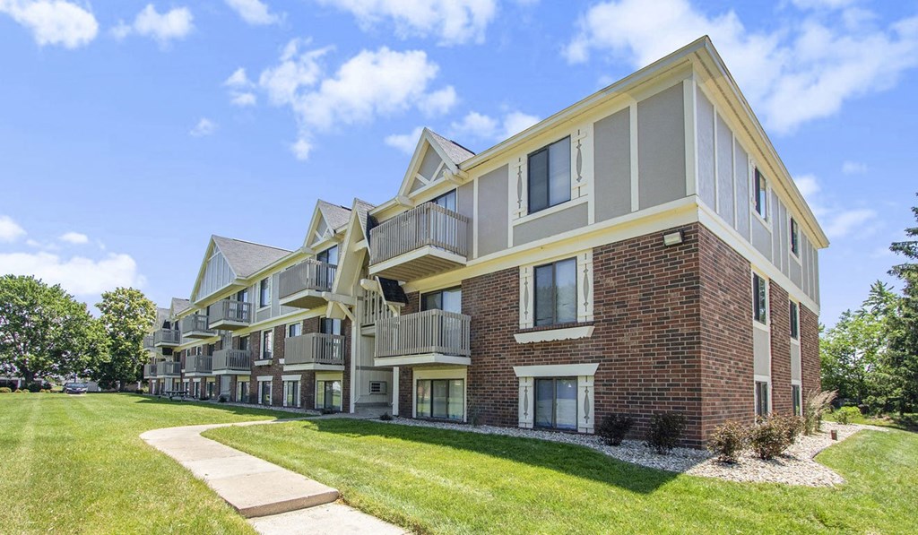 Attractive apartment building with green courtyard at Briarwood Apartments, Benton Harbor, Michigan