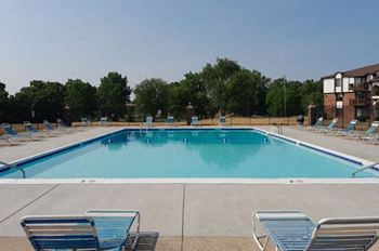 Pool With Large Sundeck and Wi-Fi at Brookside Apartments in Springfield, MI