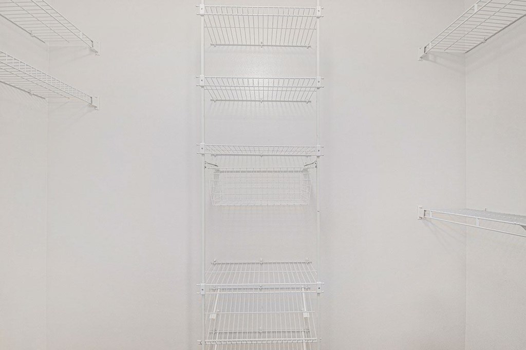 walk in closet with white shelves  at Black Sand Apartment Homes, Nebraska, 68504