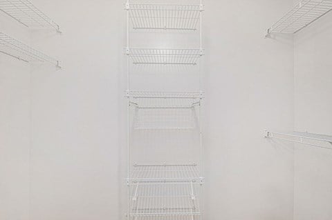 walk in closet with white shelves  at Black Sand Apartment Homes, Nebraska, 68504