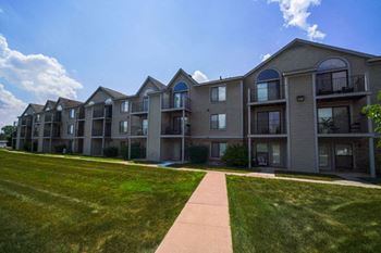 Balcony or Patio With Enclosed Storage at Dupont Lakes Apartments in Fort Wayne, IN