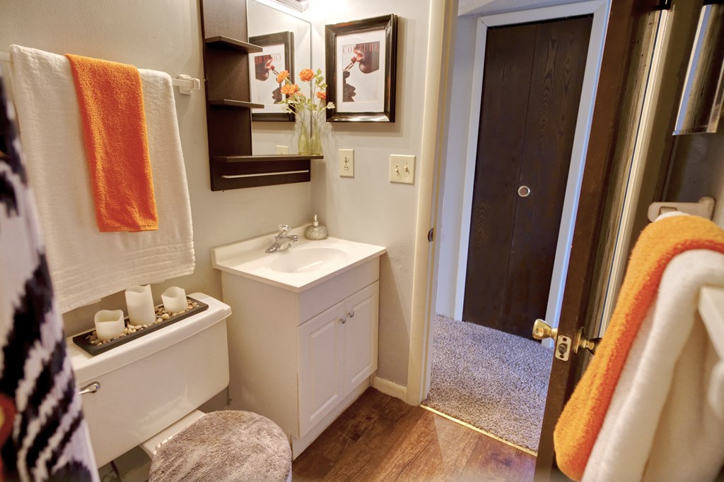 Bathroom with yellow lights at The Timbers Apartments, Evansville, 47715