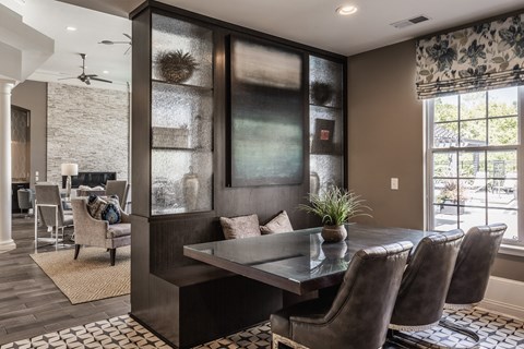 a dining room with a table and chairs at Bella Vista Apartments, Fishers, IN, 46038