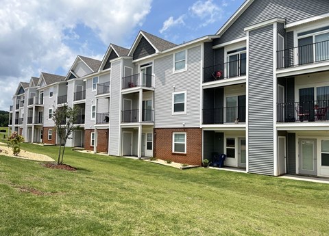 Rear Exterior Apartment Building at Chase Creek Apartment Homes in Huntsville, AL