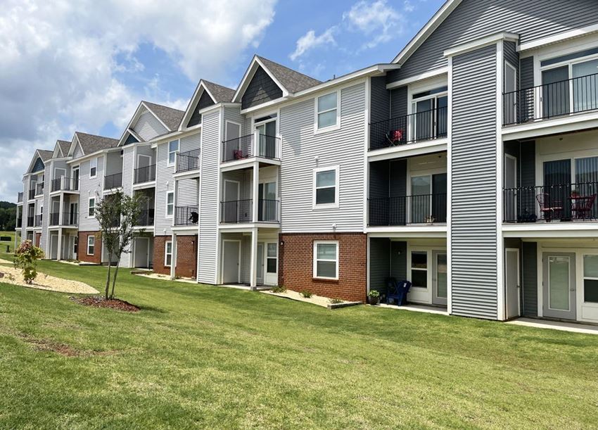 Rear Exterior Apartment Building Rear Exterior Apartment Building at Chase Creek Apartment Homes in Huntsville, AL - Photo Gallery