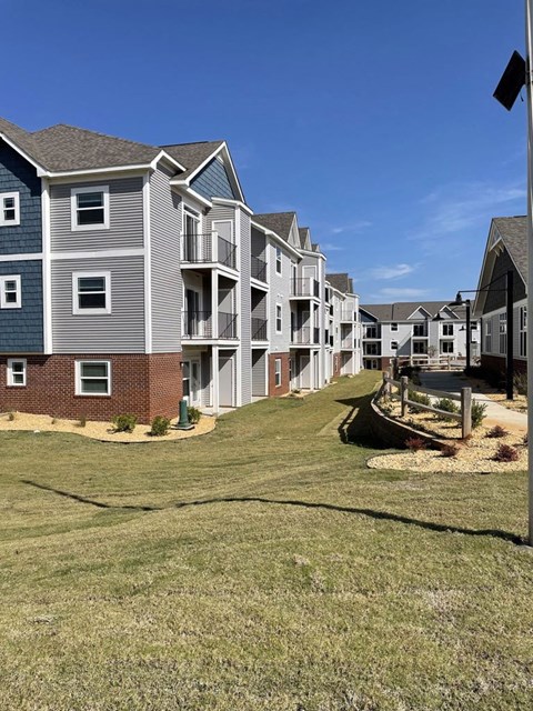 Rear Exterior Apartment Building at Chase Creek Apartment Homes in Huntsville, AL