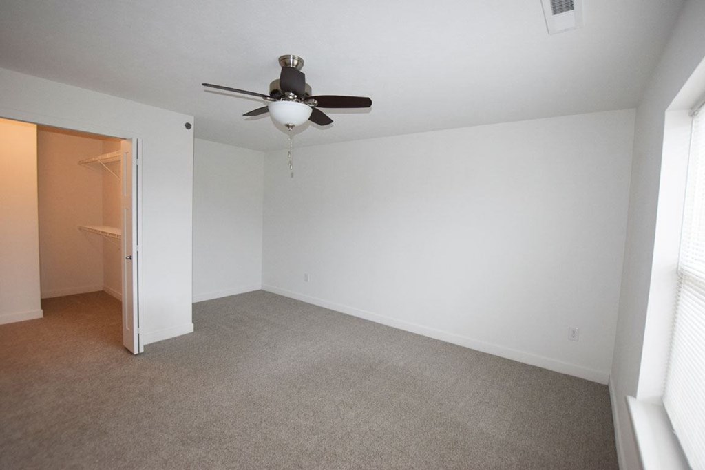 Large Bedroom With Closet at Copper Creek Apartment Homes, Maize