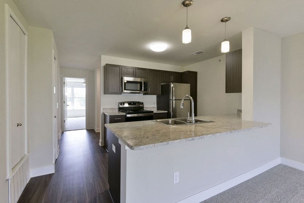 kitchen with stainless steel appliances at Copper Creek Apartment Homes, Maize, KS, 67101