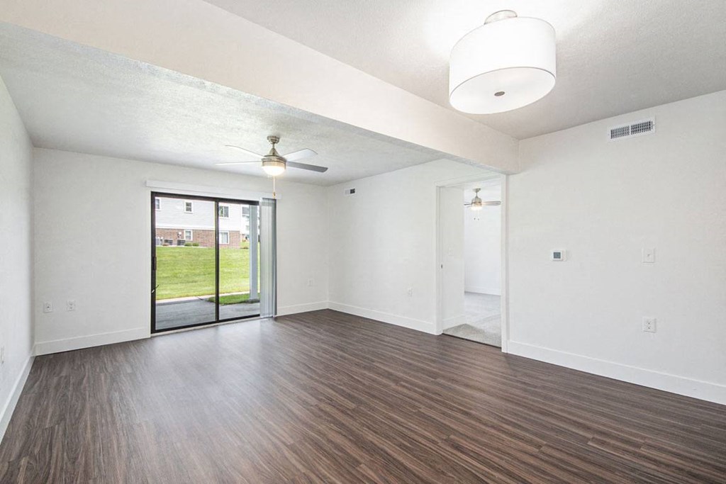 Two Bedroom Living Room with Ceiling Fan at The Crossings Apartments, Grand Rapids, Michigan