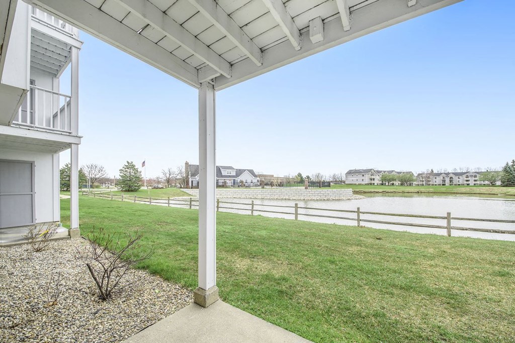 Patio with Enclosed Storage at The Crossings Apartments, Grand Rapids, Michigan