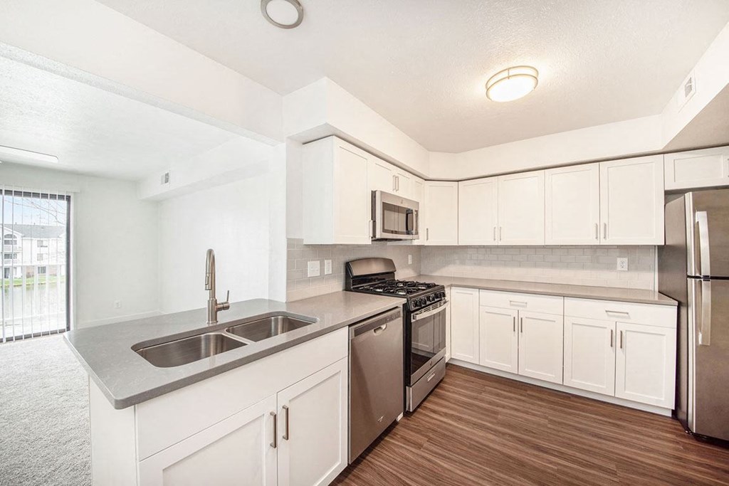 Renovated Kitchen with Subway Tile Backsplash at The Crossings Apartments, Grand Rapids, Michigan
