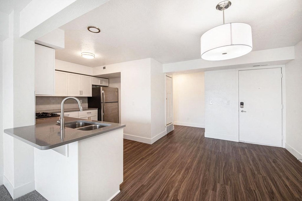 Kitchen Breakfast Bar and Dining Area at The Crossings Apartments, Grand Rapids, Michigan