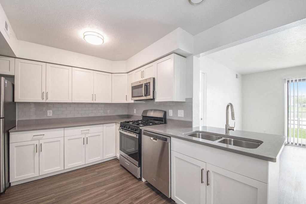 Renovated Kitchen with Shaker Cabinetry at The Crossings Apartments, Grand Rapids, Michigan