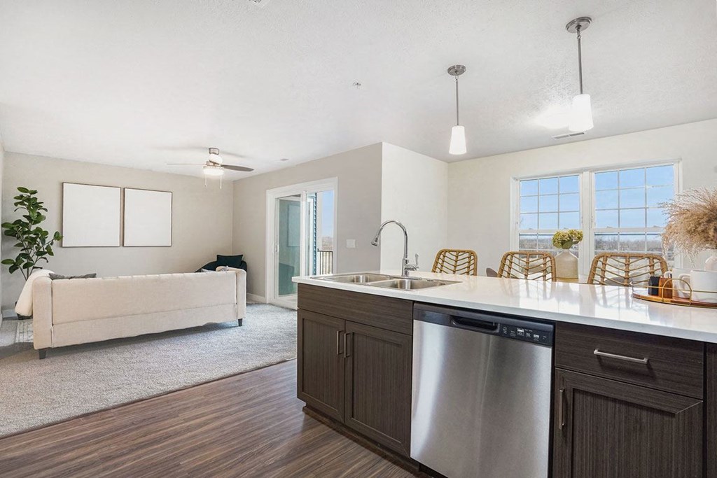 Kitchen with Dishwasher at Meadowbrooke Apartment Homes in Kentwood, MI 49512