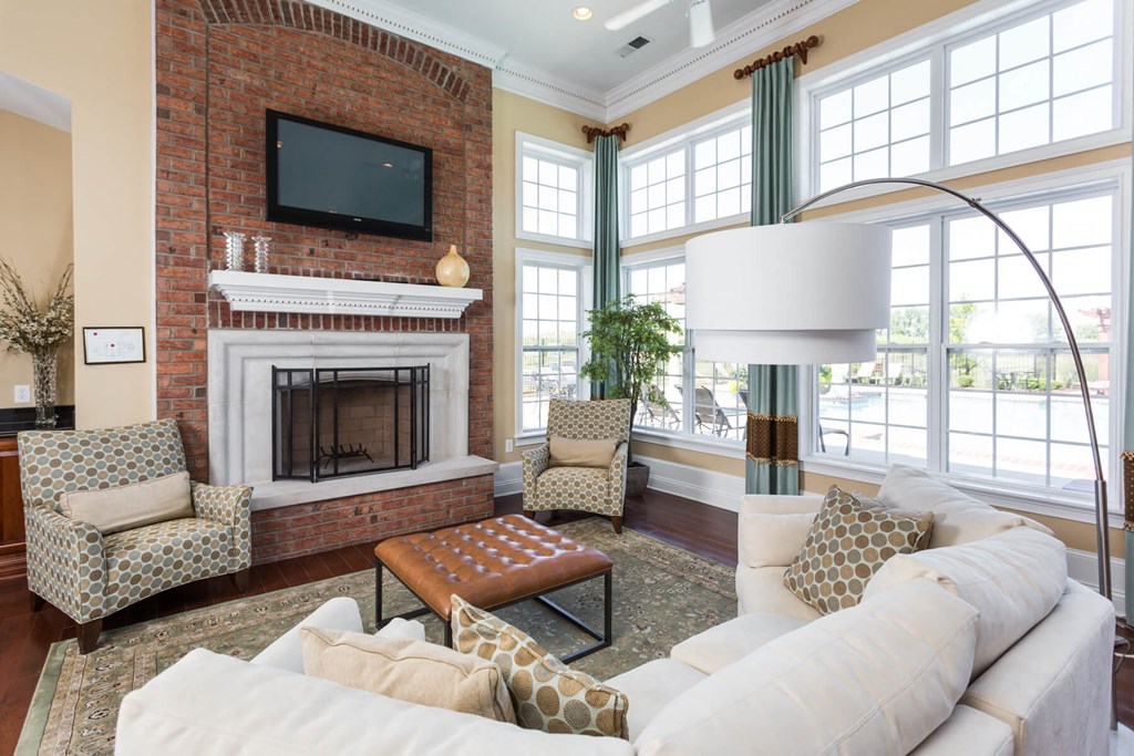 Clubhouse Fireplace and Pool View at Brickshire Apartments, Indiana, 46410