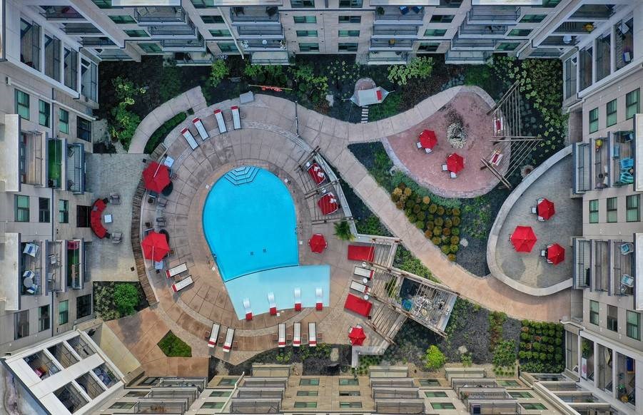 a swimming pool in the middle of a building  at Avant & Avant II, Carmel, IN, 46032