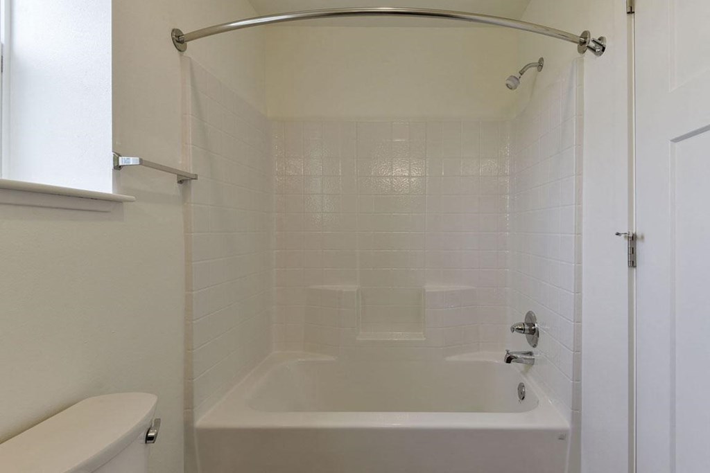 Modern Bathtub and Shower at Dodson Pointe Apartment Homes, Rogers, AR, 72758