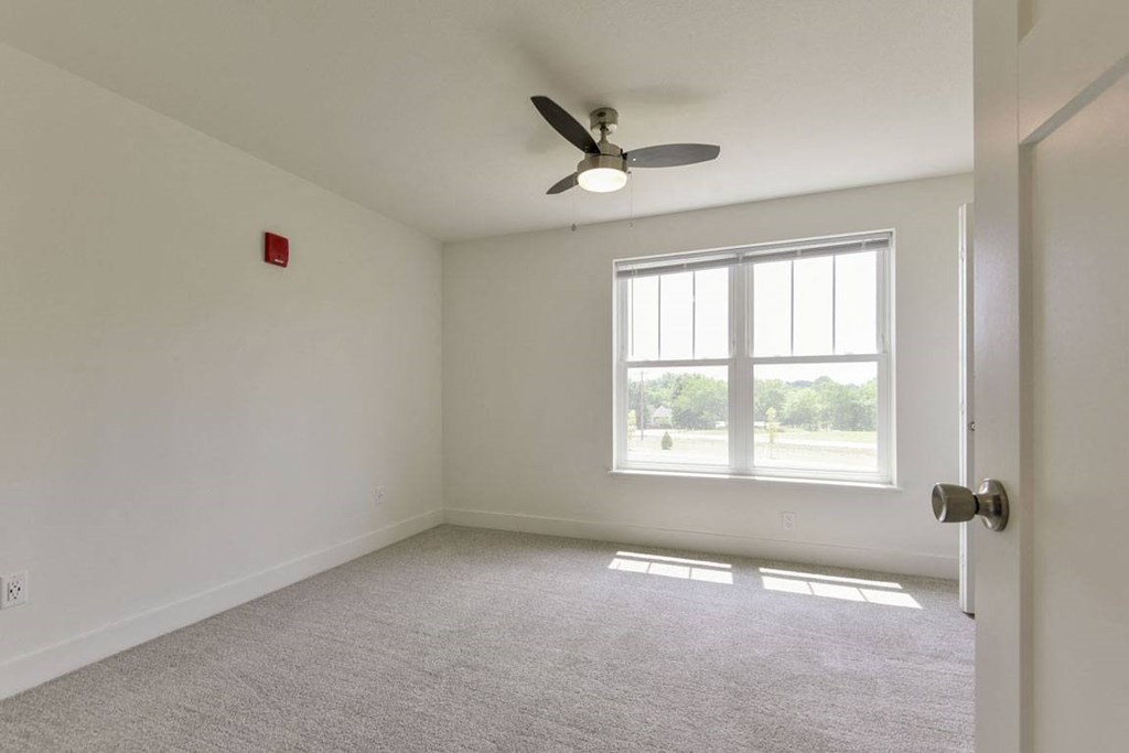 Spacious Bedroom with Large Windows at Dodson Pointe Apartment Homes, Rogers, AR, 72758