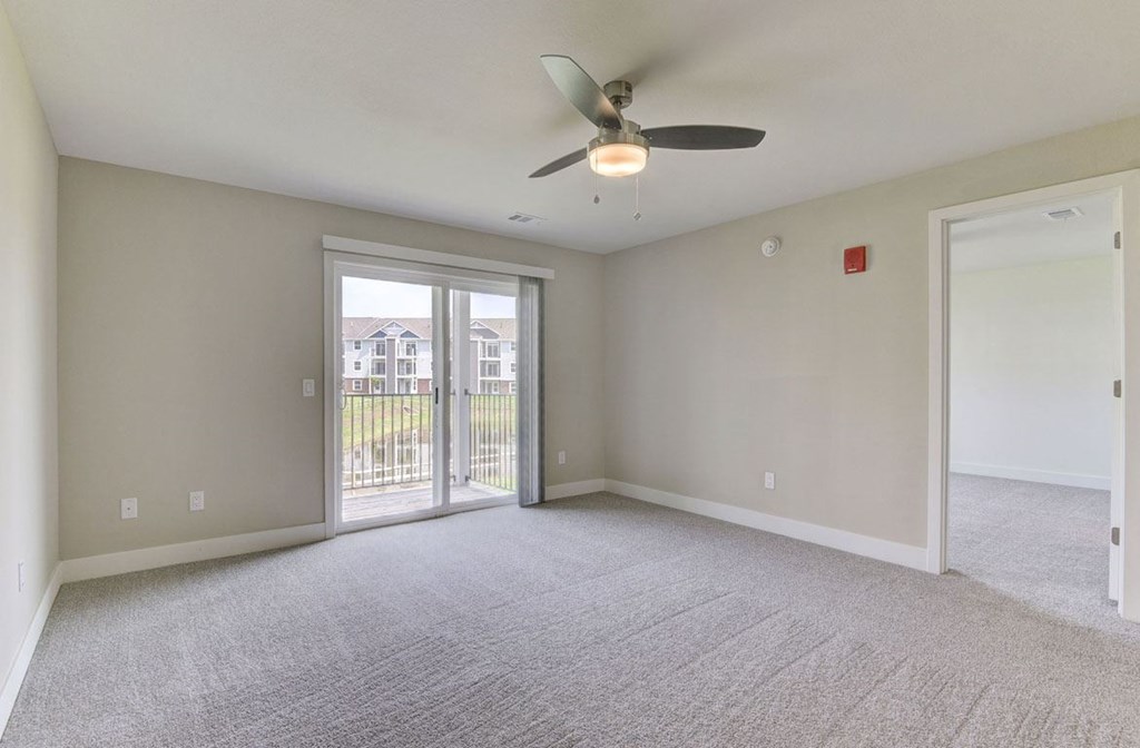 Living Room Ceiling Fan at Dodson Pointe Apartment Homes, Rogers, AR, 72758