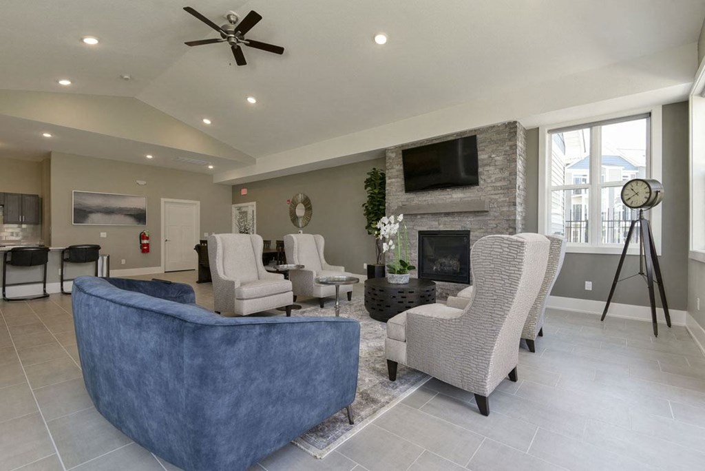 Community building with fireplace wall at Dodson Pointe Apartment Homes in Rogers, AR