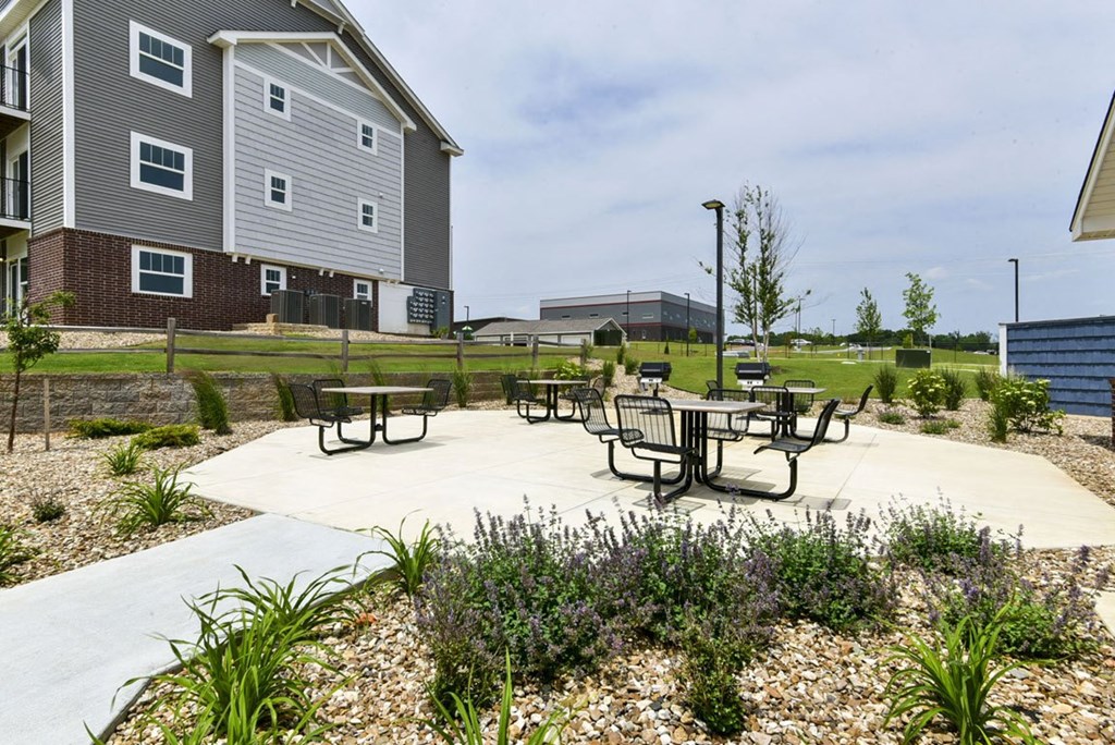Outdoor Grills With Intimate Seating Area at Dodson Pointe Apartment Homes, Rogers, AR, 72758