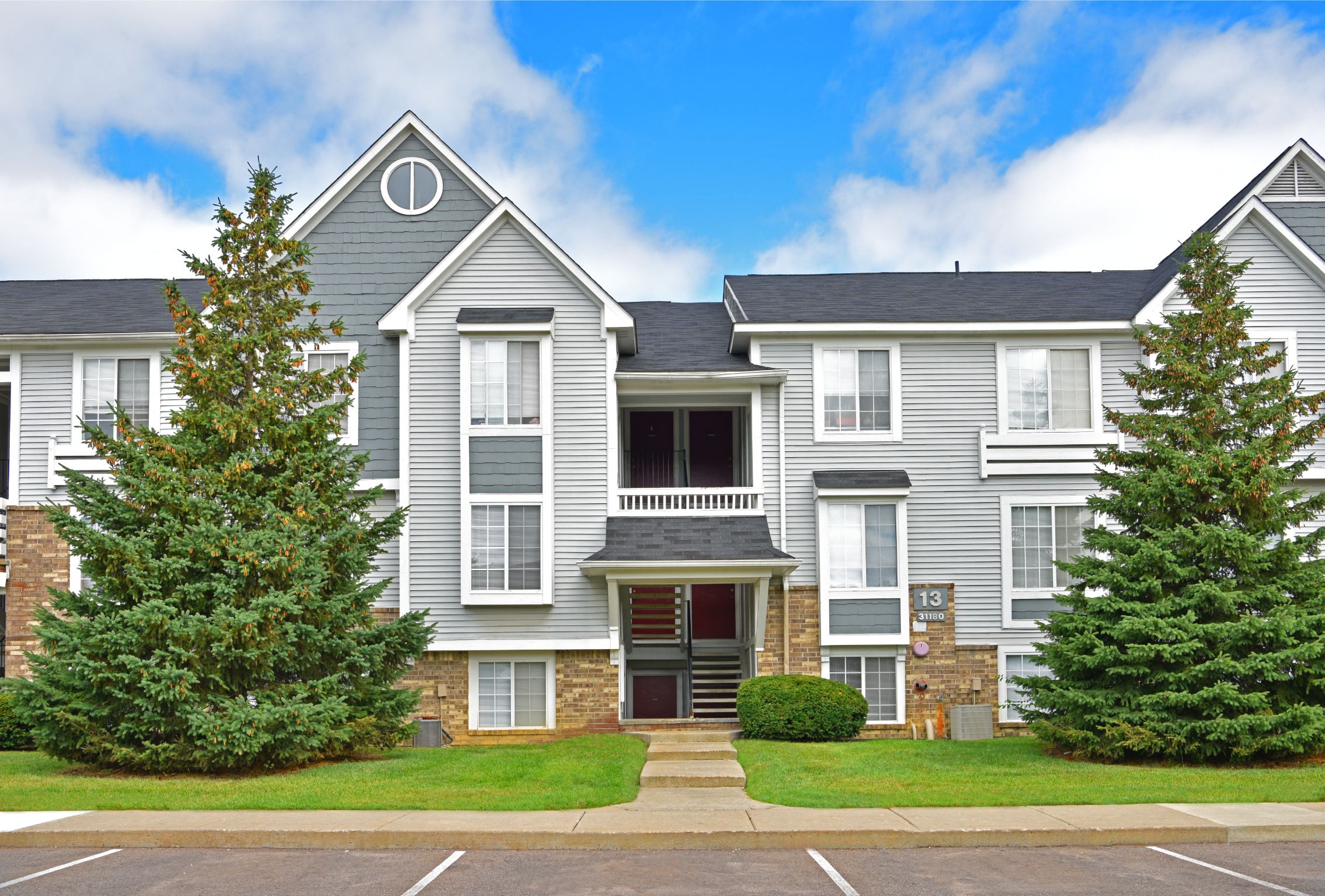 Off Street Parking at Portsmouth Apartments, Novi, MI