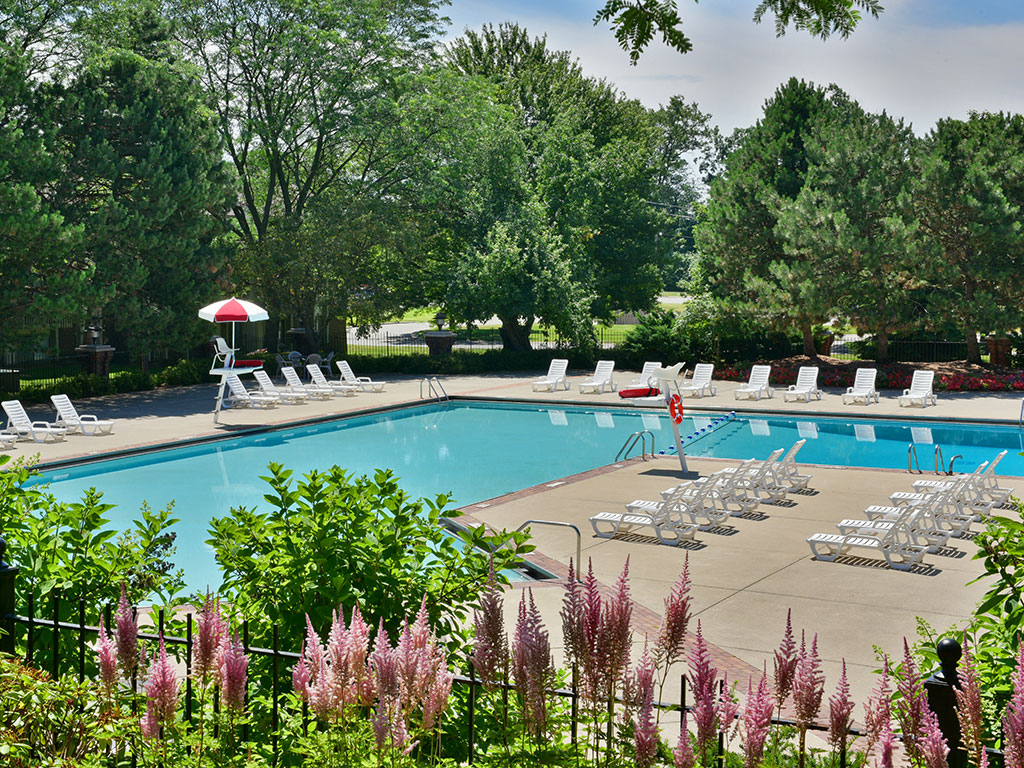 Scenic Pool Surroundings at The Village Apartments, Michigan