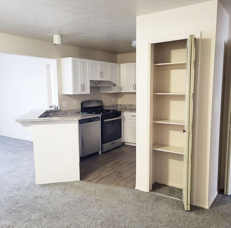 Renovated kitchen with white cabinets