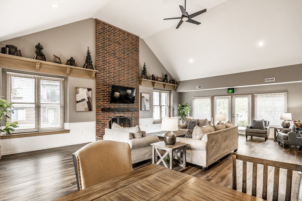 A living room with a fireplace and a couch