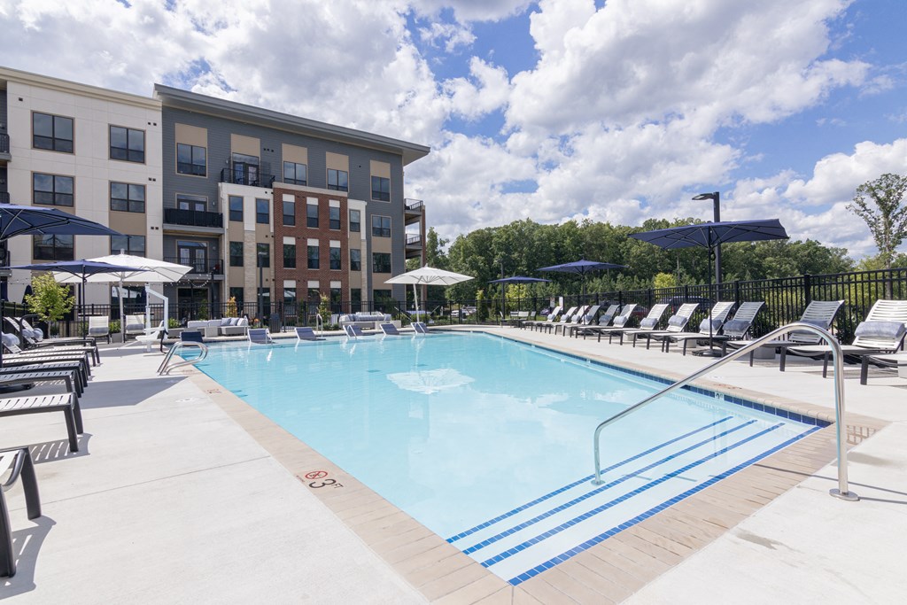 our apartments have a large resort style pool with lounge chairs