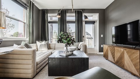 a living room with a couch and a television