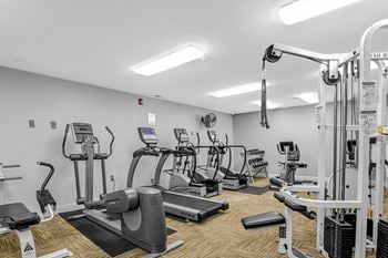 State of the art fitness room includes cardio machines and weights at Pheasant Run, Lafayette, IN, 47909